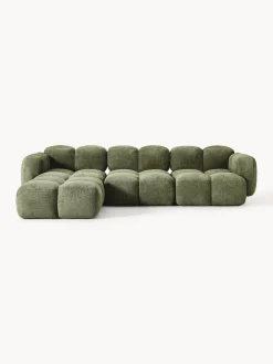 Sofá modular de borreguillo bouclé con reposapiés Tayla (4 plazas)