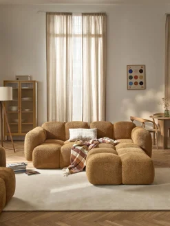 Sofá modular de borreguillo bouclé con reposapiés izquierdo/derecho Tayla (3 plazas)