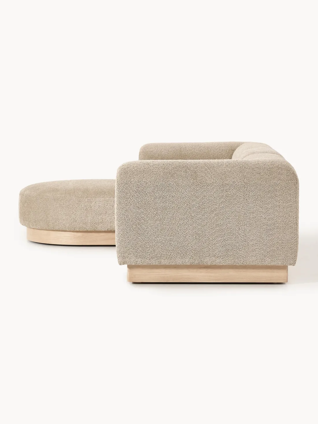 Sofá modular de borreguillo bouclé con reposapiés Natalie (3 plazas, izquierda/derecha)