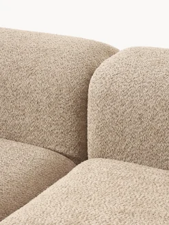 Sofá modular de borreguillo bouclé con reposapiés Natalie (3 plazas, izquierda/derecha)