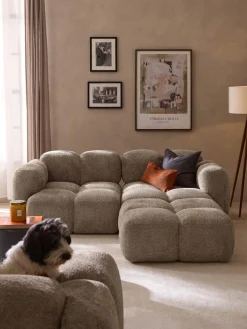 Sofá modular de borreguillo bouclé con reposapiés Tayla (3 plazas)