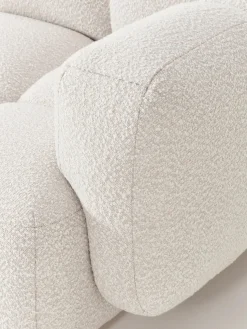 Sofá modular en tejido bouclé con reposapiés Tayla (4 plazas)