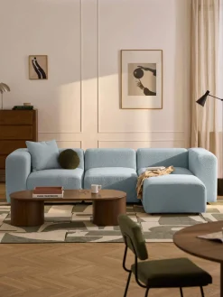 Sofá modular en tejido bouclé con reposapiés izquierdo/derecho Lena (4 plazas)