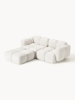 Sofá modular en tejido bouclé con reposapiés Tayla (3 plazas)