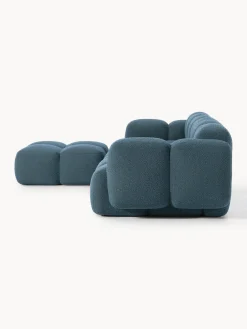 Sofá modular en tejido bouclé con reposapiés Tayla (4 plazas)