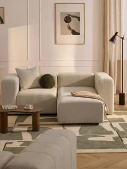 Sofá modular en tejido bouclé con reposapiés izquierdo/derecho Lena (3 plazas)