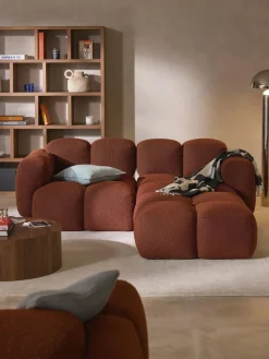 Sofá modular en tejido bouclé con reposapiés Tayla (3 plazas)