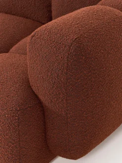 Sofá modular en tejido bouclé con reposapiés Tayla (3 plazas)