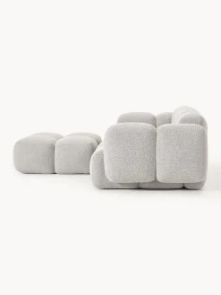Sofá modular en tejido bouclé con reposapiés Tayla (3 plazas)
