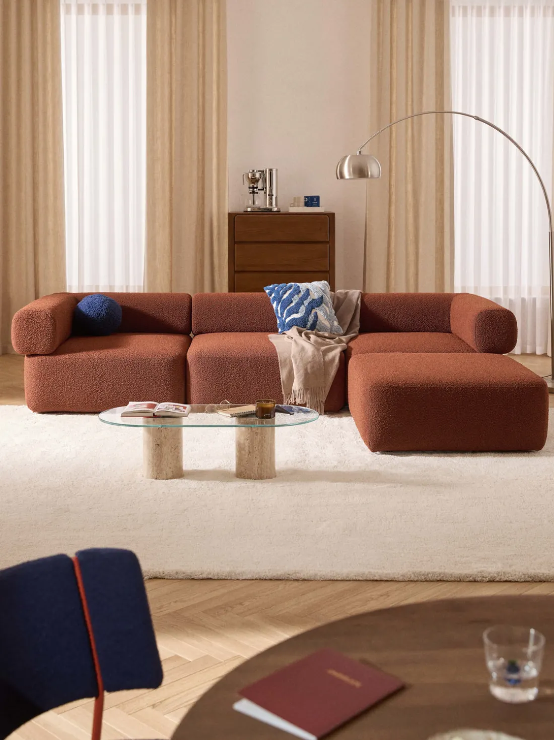 Sofá modular en tejido bouclé Anton (4 plazas), con reposapiés (izquierda/derecha)