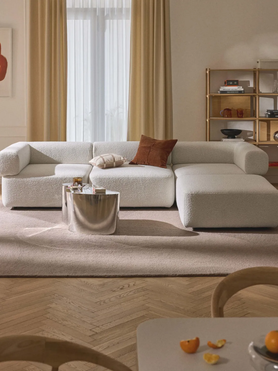 Sofá modular en tejido bouclé Anton (4 plazas), con reposapiés (izquierda/derecha)