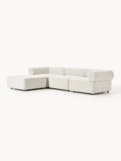 Sofá modular en tejido bouclé Anton (4 plazas), con reposapiés (izquierda/derecha)