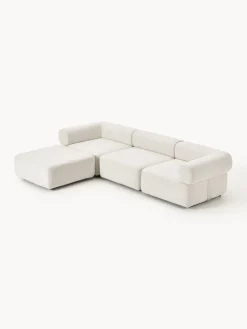 Sofá modular en tejido bouclé Anton (4 plazas), con reposapiés (izquierda/derecha)