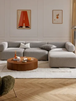 Sofá modular en tejido bouclé Anton (4 plazas), con reposapiés (izquierda/derecha)